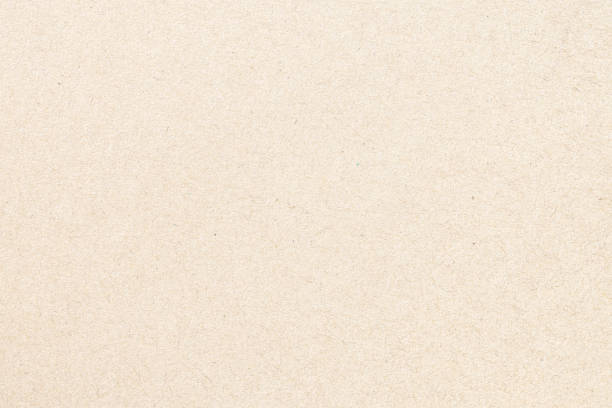 istock Natural pale brown paper texture pad abstract background 1385301226