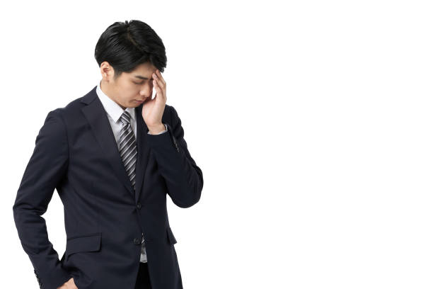 asian businessman who fails and regrets - isolated businessman sadness business person imagens e fotografias de stock