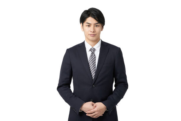 asian businessman greeting with a serious expression - bowing imagens e fotografias de stock