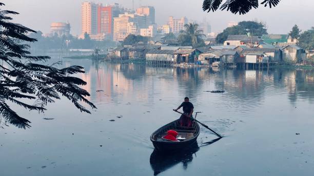 Ferry boat on lake in Dhaka stock photo