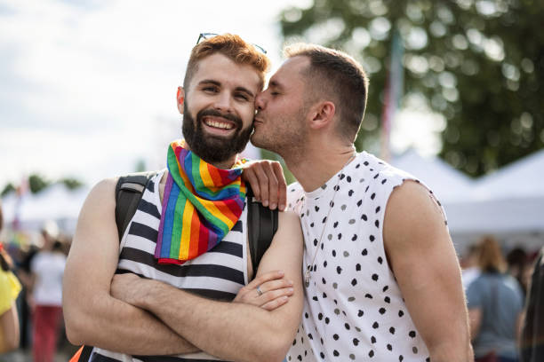 istock Gay couple kissing 1385319918