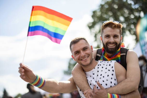 istock Men at the LGBTQ pride parade 1385319919