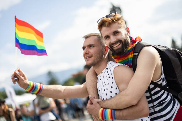 istock Men at the LGBTQ pride parade 1385319920