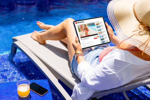 istock Woman watching online videos on tablet 1385323072