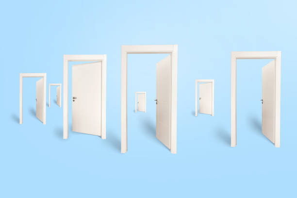 istock Open white doors. New job opportunities concept. 1385326801