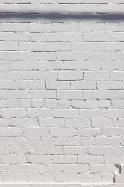 istock Part of an old gray brick wall 1385326997