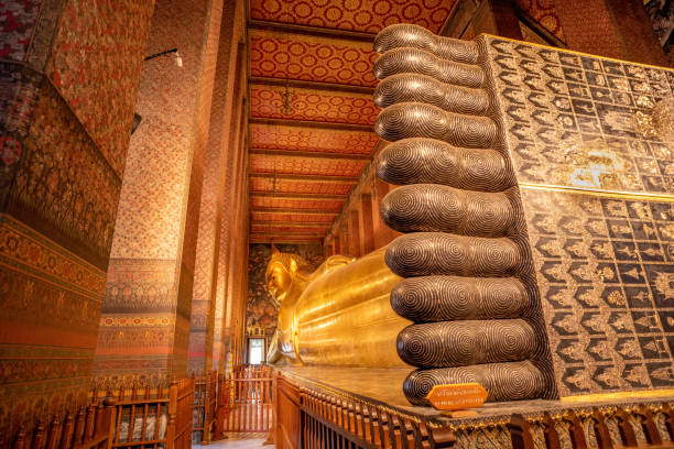 istock Giant reclining Buddha statue 1385327517