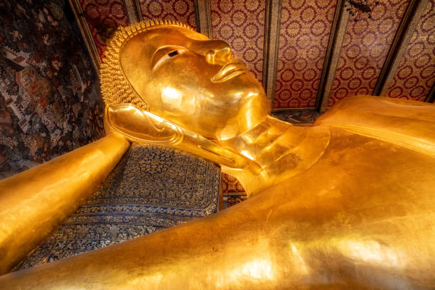 istock Giant reclining Buddha statue 1385327594