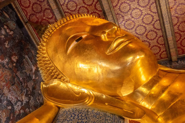 Giant reclining Buddha statue stock photo