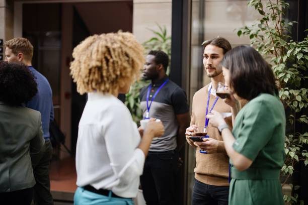 istock Business professionals having a casual chat during coffee break 1385328424