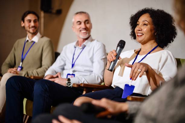 istock Close up of a female panelist sharing her own perspective on current topic 1385328435