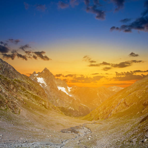 istock mountain valley at the sunset 1385333262