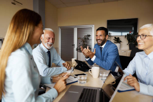 istock Mixed age range business people having business meeting in the office 1385340107