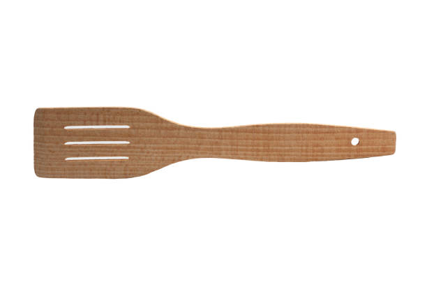 istock Flat unpainted handmade wooden spatula for mixing, cooking and baking on a white background. 1385340874