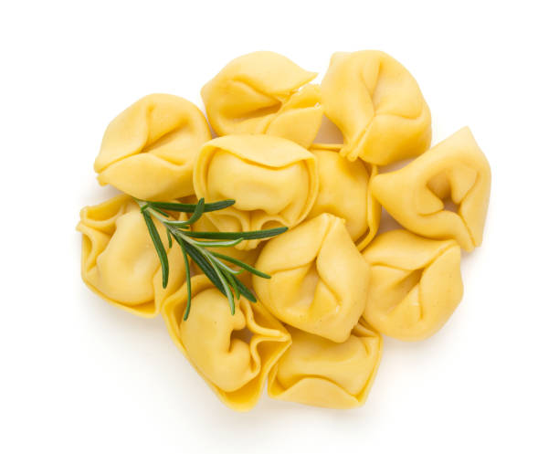 istock Raw homemade pasta,tortellini with herbs. 1385342779