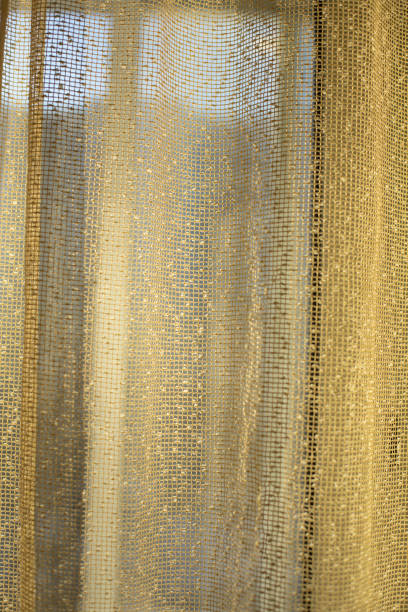 istock Curtains in sunlight. Curtains on window. Fabric shines through. 1385343101