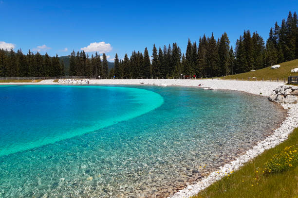 Lake Montagnoli and beautiful panoramic view in Trentino, travel and landscapes in the Adamello-Brenta park in Italy