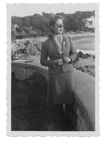 Beautiful young woman in front of sea,1938.