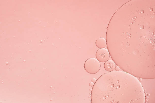 Abstract pink oil bubbles background.