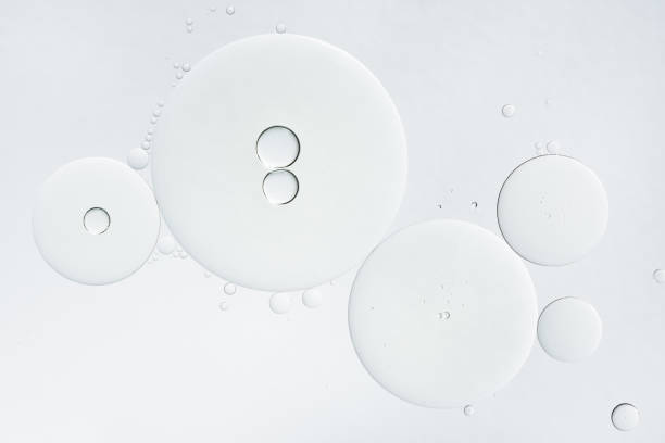 Abstract oil bubbles background. Cosmetic liquid beauty product.