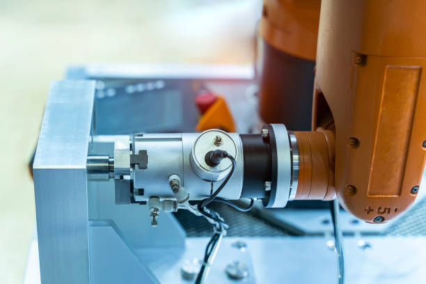istock Automatic industrial robotic robot working, industry 4.0 and technology concept 1385368176
