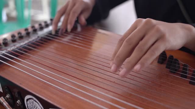 Kecapi - a traditional musical instrument from Indonesia, usually played by plucking like a guitar. This harp musical instrument is almost the same as the harp