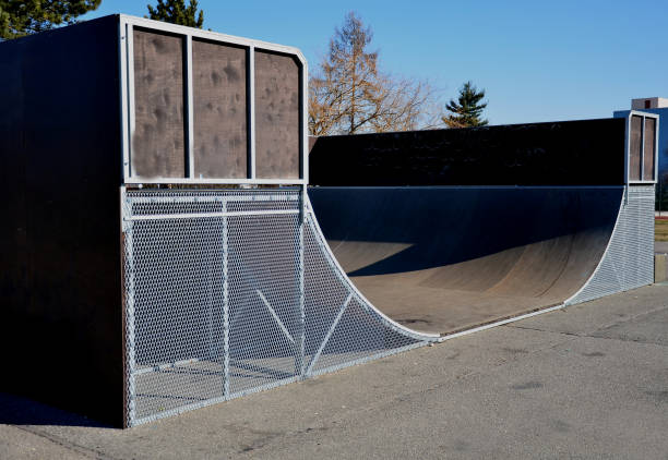 istock metal construction ramp for skateboarding, serves as a platform for riding with an inline scooter or bmx bike free style. wooden bent boards made of waterproof plywood 1385371474