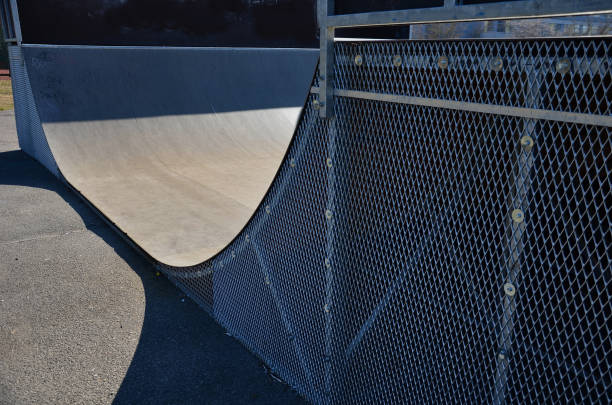 istock metal construction ramp for skateboarding, serves as a platform for riding with an inline scooter or bmx bike free style. wooden bent boards made of waterproof plywood 1385371477