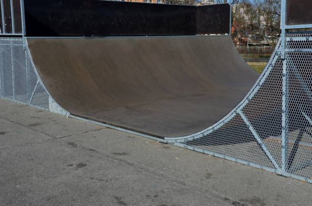 istock metal construction ramp for skateboarding, serves as a platform for riding with an inline scooter or bmx bike free style. wooden bent boards made of waterproof plywood 1385371666
