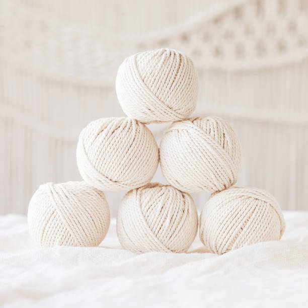 istock Handmade macrame braiding and cotton threads. Image good for macrame and handicrafts banners and advertisement.  Copy space 1385371694
