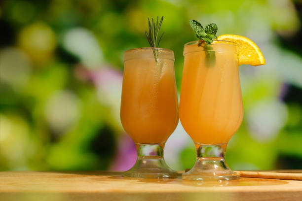 istock Two fruit summer mocktails outdoors 1385376699