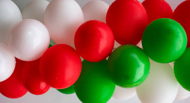 istock Wet green, white and red air balloons 1385376802