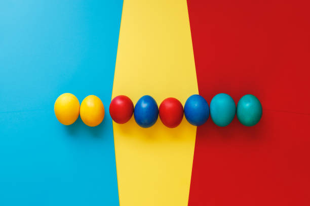 istock Easter eggs colored with organic dyes on  paper background 1385377502