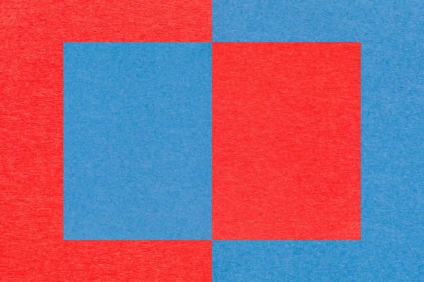 istock Texture of blue and red paper background with geometric shape and pattern, macro. Structure of dense kraft cardboard. 1385382781