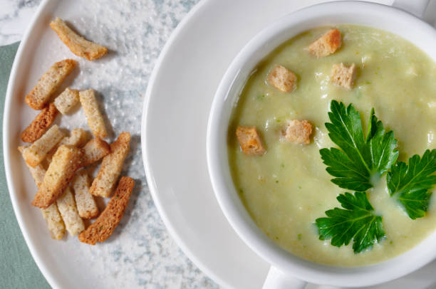 istock Broccoli puree soup with potatoes and cream. 1385385847
