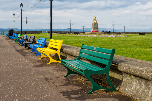 Colourful Benches on the promenade by the War Memorial at Largs, Ayrshire
