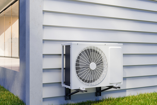 istock Air Conditioning Unit On Building Facade 1385394123