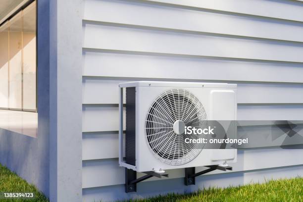 Air Conditioning Unit On Building Facade Stock Photo - Download Image Now - Heat - Temperature, Water Pump, Wind