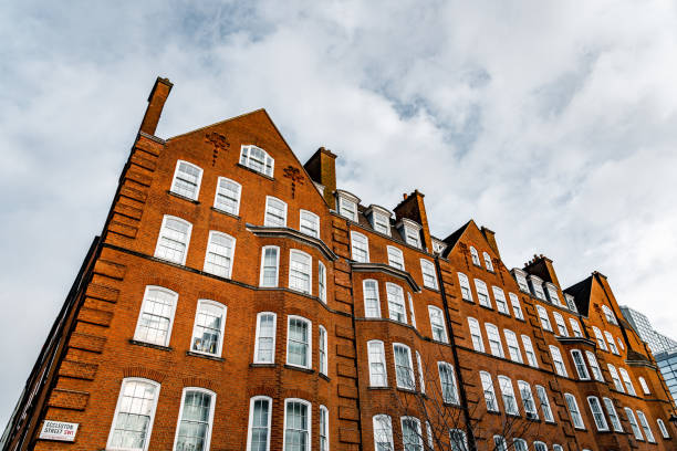 istock Old brick apartment buildings in London 1385394652