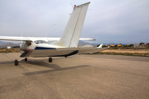 istock Ultra light aircraft at the airport. View from afar 1385398041