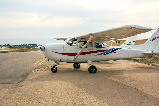 Seattle, Washington, United States: 1975 Cessna 172M with registration N707P shown parked on a rainy day.