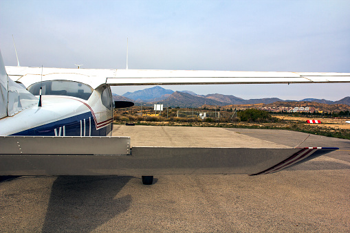 Ultra light aircraft at the airport on the runway. Close up.