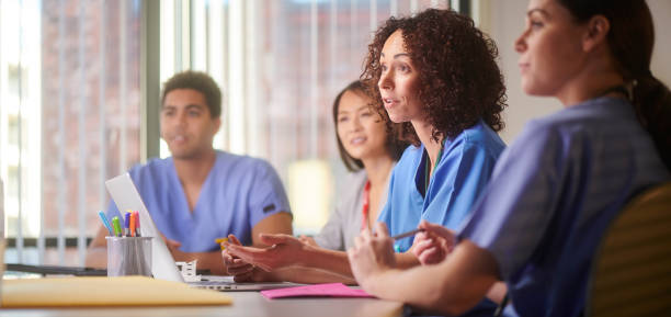 istock medical staff meeting 1385403771