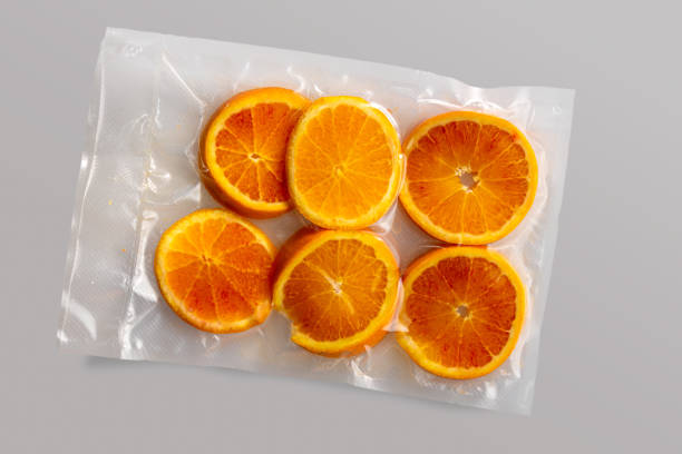 istock Slices of oranges fruit in vacuum 1385403798