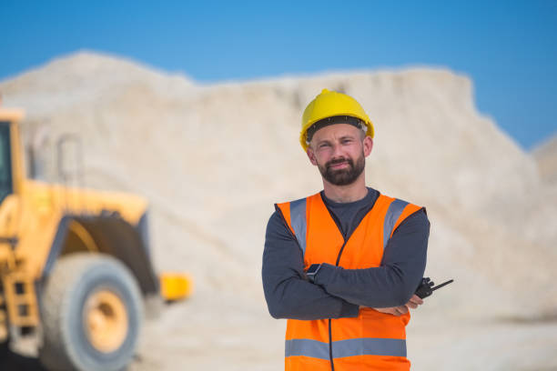 istock Portrait of open-pit mine worker 1385405433
