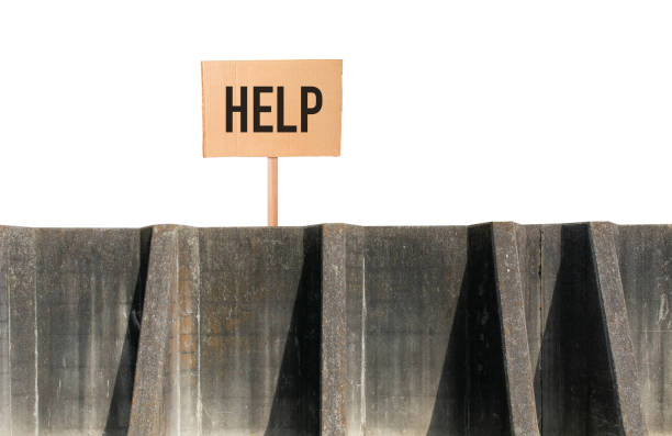 Concrete walls and help sign