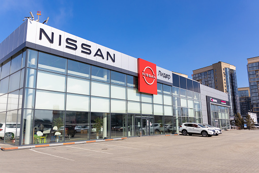 Krasnoyarsk, Russia - March 13, 2022: Nissan dealership store. Showroom of a Japanese brand