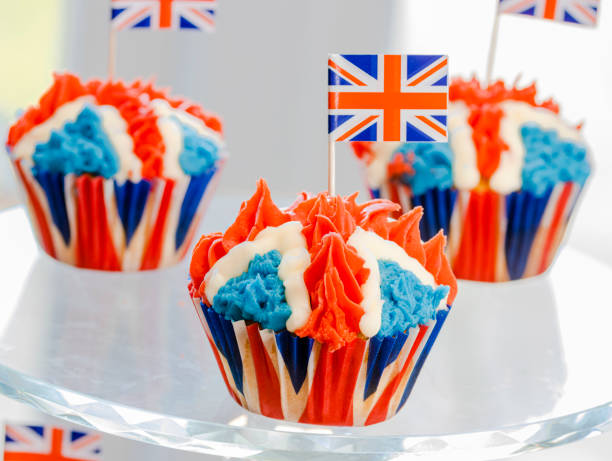 Royal Jubilee Cupcakes for Platinum Jubilee Celebrations Red White and Blue, British Royal Jubilee Cupcakes, to celebrate the Queen's Platinum Jubilee. Designed in the shape of the Union Jack Flag, to represent Great Britain's monarchy in preparation for the Platinum Lunch and street parties that will be happening around the Uk in June. platinum photos stock pictures, royalty-free photos & images