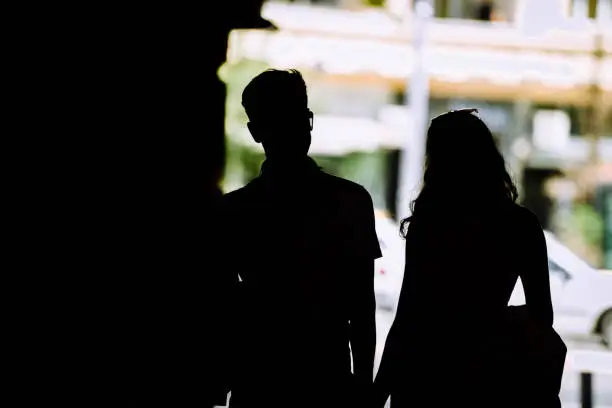 Photo of Man and woman posing and have fun in the old town