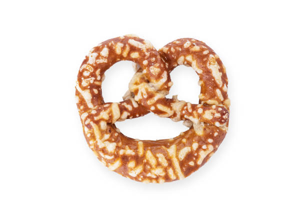 istock Salty brown pretzel isolated on white background 1385429932